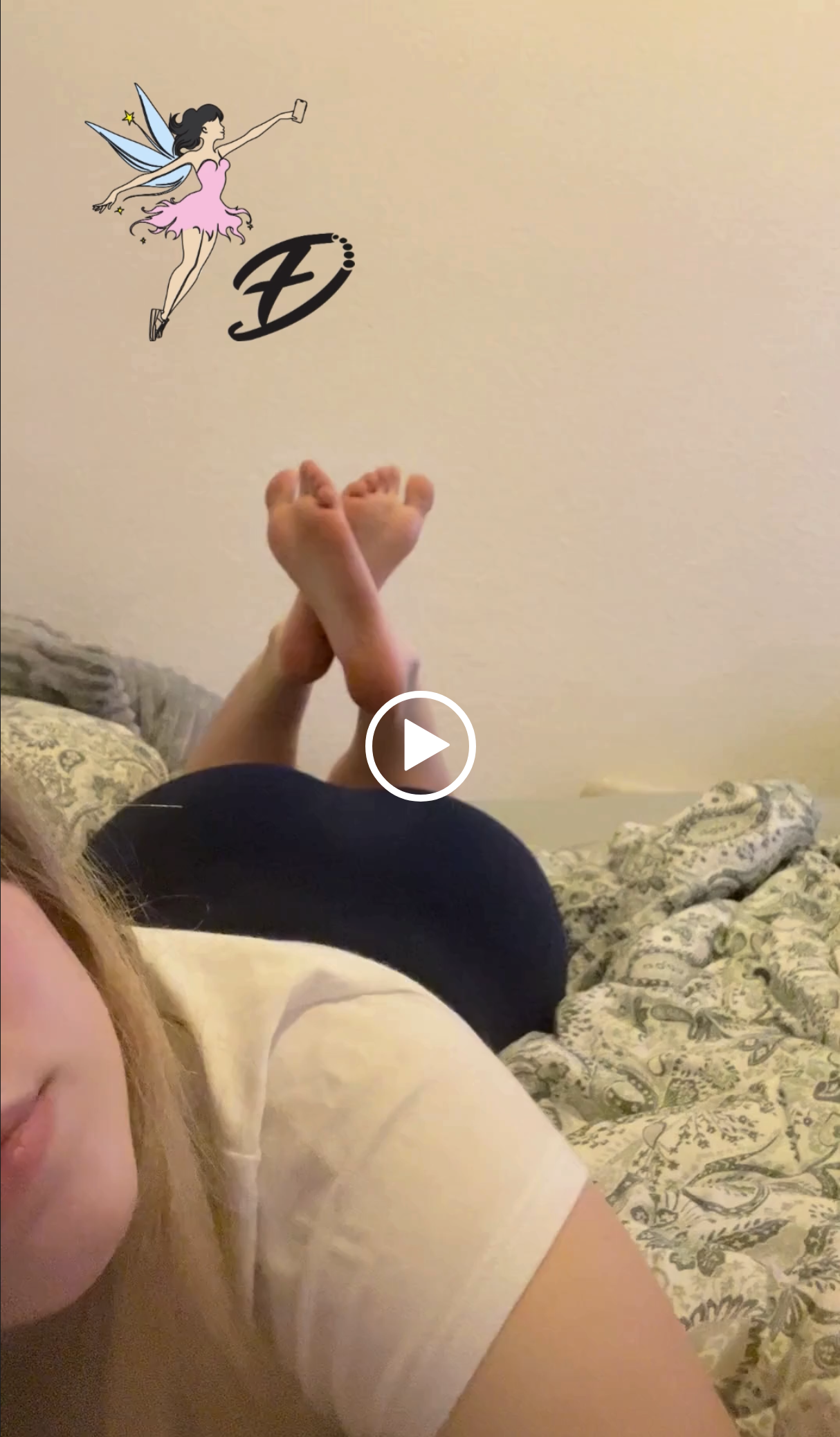 Emelie in her bed showing her perfect soles
